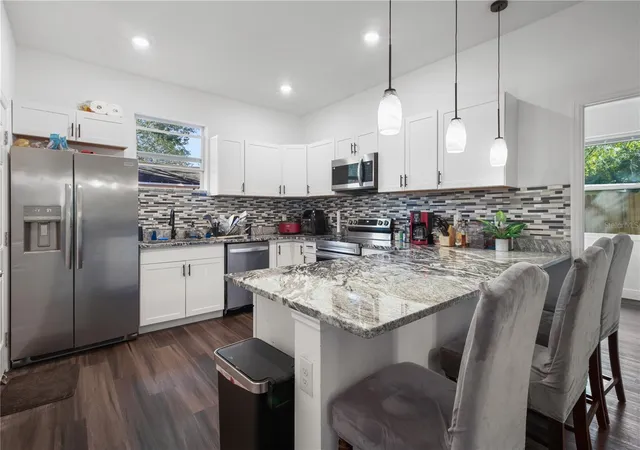 Photo 3 of Single family home for sale at 4411 N Troy St, Tampa, FL 33610 | MLS# TB8552031 | Listing updated on 2026-09-25