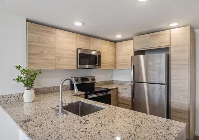 Photo 4 of Condo for sale at 1210 Southstation Pl #202, Orlando, FL 32809 | MLS# O6444686 | Listing updated on 2026-09-25