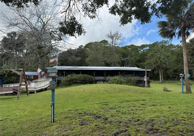 Photo 3 of Manufactured home for sale at 1844 Papaya St, Bunnell, FL 32110 | MLS# FC321694 | Listing updated on 2026-09-29