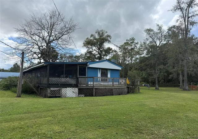Photo 4 of Manufactured home for sale at 1844 Papaya St, Bunnell, FL 32110 | MLS# FC321694 | Listing updated on 2026-09-29