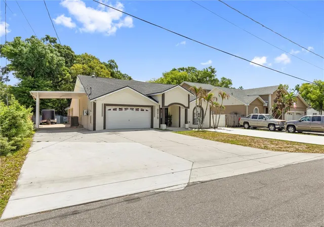 Photo 2 of Single family home for sale at 8019 N Gomez Ave, Tampa, FL 33614 | MLS# TB8552056 | Listing updated on 2026-10-04