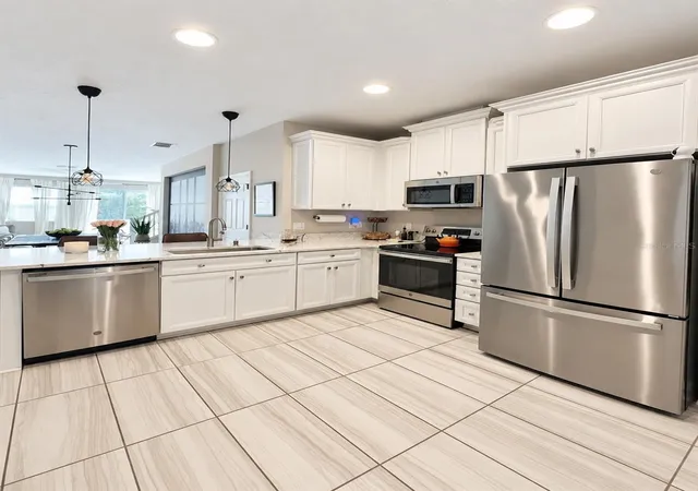 Photo 4 of Townhouse for sale at 2429 Foggy Crk Cir, Clearwater, FL 33764 | MLS# TB8552073 | Listing updated on 2026-10-07