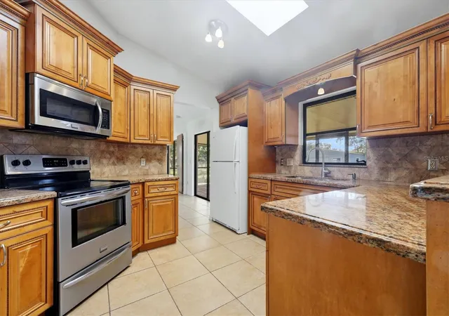 Photo 3 of Single family home for sale at 21483 Bancroft Ave, Port Charlotte, FL 33954 | MLS# C7531206 | Listing updated on 2026-10-22