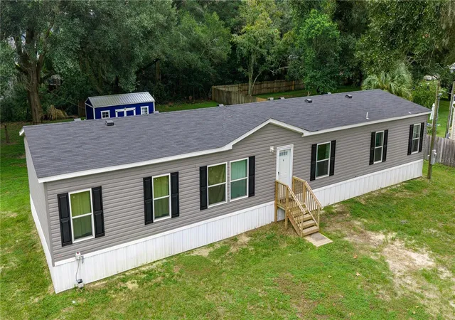 Photo 3 of Manufactured home for sale at 10838 Se 129th Lane, Belleview, FL 34420 | MLS# OM732877 | Listing updated on 2026-09-26