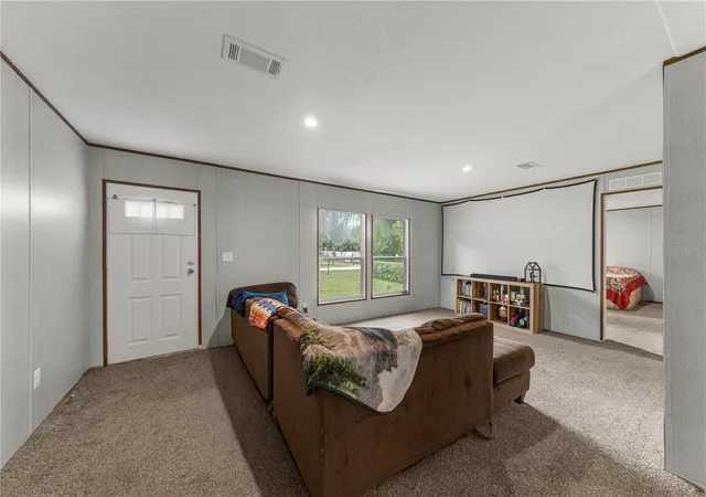 Photo 4 of Manufactured home for sale at 10838 SE 129th Lane, Belleview, FL 34420 | MLS# OM732877 | Listing updated on 2026-09-26