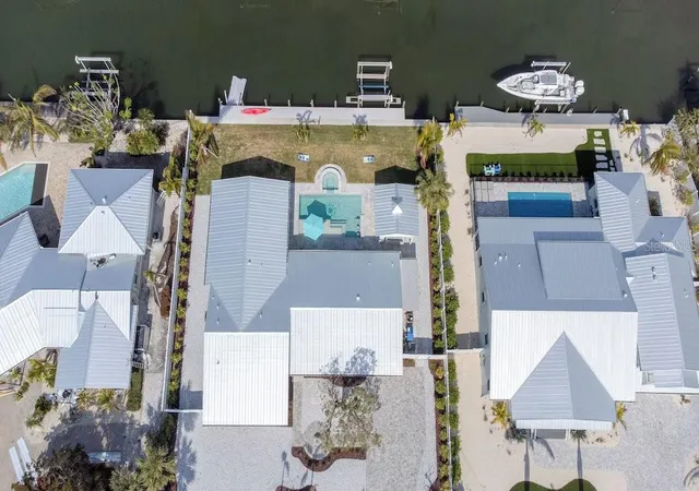 Photo 1 of Single family home for sale at 605 Concord Ln, Holmes Beach, FL 34217 | MLS# A4707403 | Listing updated on 2026-10-05