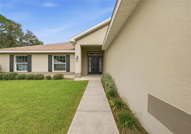 Photo 2 of Single family home for sale at 3962 Ne 58th Circle, Silver Springs, FL 34488 | MLS# OM732887 | Listing updated on 2026-09-26