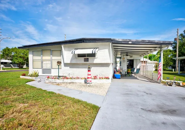 Photo 2 of Manufactured home for sale at 76 Liberty Way #5, Palm Harbor, FL 34684 | MLS# W7889833 | Listing updated on 2026-10-08