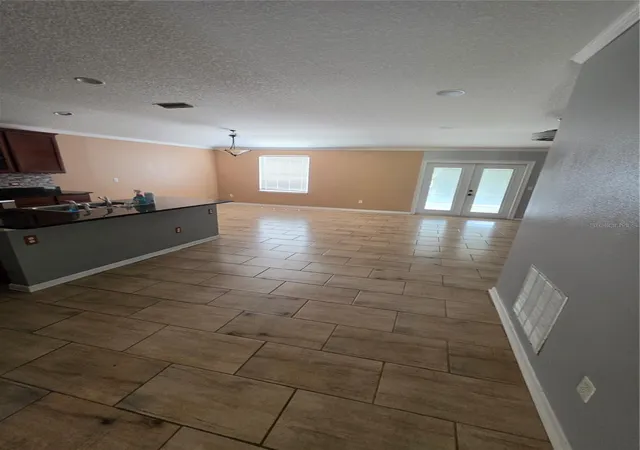 Photo 3 of Single family home for sale at 9712 Woodstone Ml Dr, Jacksonville, FL 32244 | MLS# TB8552229 | Listing updated on 2026-09-29