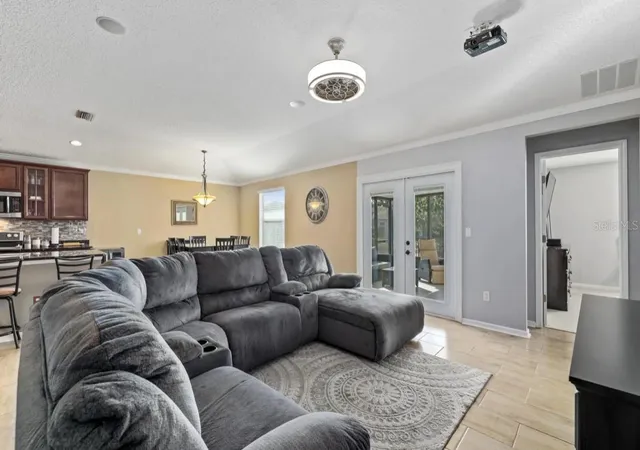 Photo 3 of Single family home for sale at 9712 Woodstone Ml Dr, Jacksonville, FL 32244 | MLS# TB8552229 | Listing updated on 2026-09-29