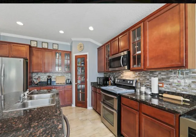 Photo 4 of Single family home for sale at 9712 Woodstone Ml Dr, Jacksonville, FL 32244 | MLS# TB8552229 | Listing updated on 2026-09-29