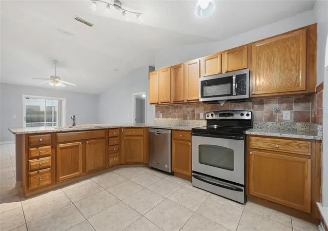 Photo 2 of Single family home for sale at 663 Jaguar Ct, Kissimmee, FL 34759 | MLS# O6444880 | Listing updated on 2026-10-13
