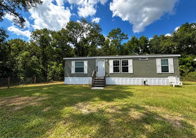 Photo 1 of Manufactured home for sale at 148 Ne 155th Terrace, Williston, FL 32696 | MLS# OM732898 | Listing updated on 2026-09-30