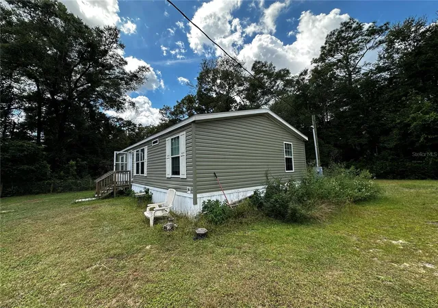 Photo 2 of Manufactured home for sale at 148 Ne 155th Terrace, Williston, FL 32696 | MLS# OM732898 | Listing updated on 2026-09-30