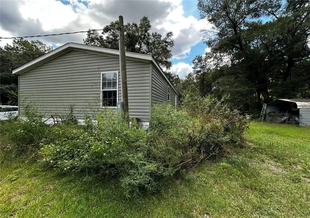 Photo 3 of Manufactured home for sale at 148 NE 155th Terrace, Williston, FL 32696 | MLS# OM732898 | Listing updated on 2026-09-30