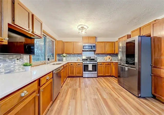 Photo 3 of Single family home for sale at 825 Mellowood Ave, Orlando, FL 32825 | MLS# O6444932 | Listing updated on 2026-10-09