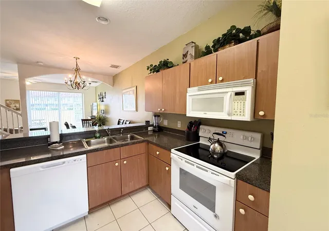 Photo 2 of Townhouse for sale at 1213 S Beach Cir, Kissimmee, FL 34746 | MLS# S5158327 | Listing updated on 2026-10-05