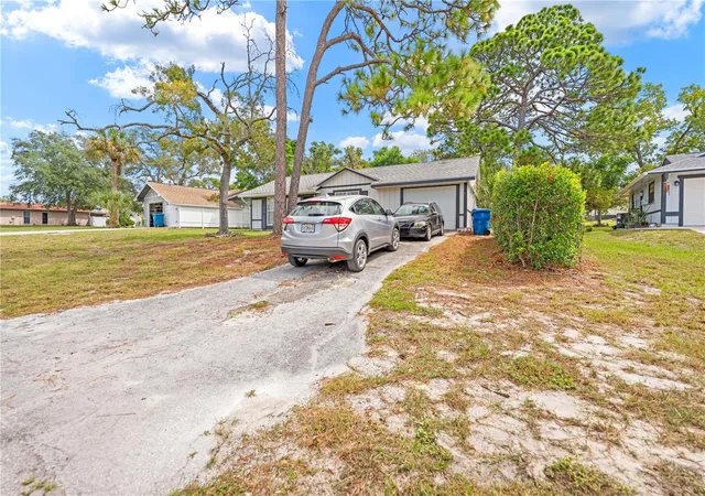 Photo 3 of Single family home for sale at 7450 Dundee Way, Weeki Wachee, FL 34613 | MLS# TB8552314 | Listing updated on 2026-10-07