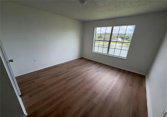 Photo 3 of Condo for sale at 1213 Bermuda Lakes Ln #206, Kissimmee, FL 34741 | MLS# S5158337 | Listing updated on 2026-09-26