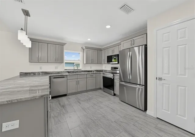 Photo 2 of Single family home for sale at 2210 1st Avenue E, Palmetto, FL 34221 | MLS# TB8552352 | Listing updated on 2026-09-30