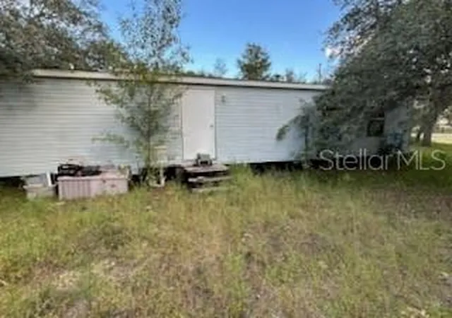Photo 3 of Manufactured home for sale at 13331 Southeast 30th St, Morriston, FL 32668 | MLS# O6444999 | Listing updated on 2026-10-04