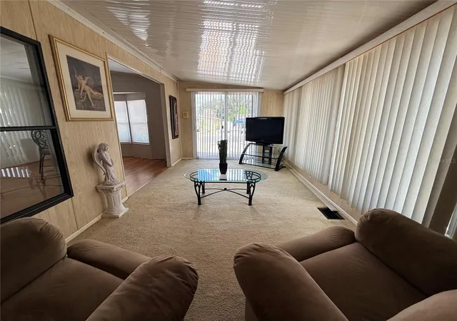 Photo 3 of Manufactured home for sale at 427 Center Crst Blvd, Davenport, FL 33837 | MLS# S5158346 | Listing updated on 2026-09-29