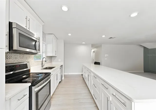 Photo 4 of Single family home for sale at 1151 55th Avenue S, Saint Petersburg, FL 33705 | MLS# TB8552386 | Listing updated on 2026-09-29