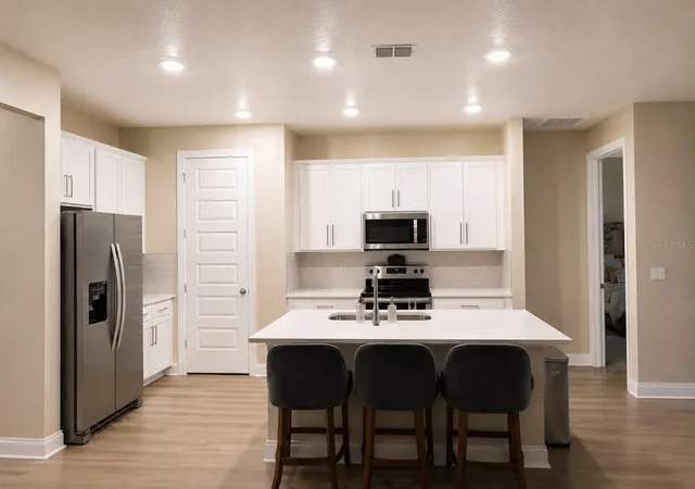 Photo 3 of Single family home for sale at 8582 Dahlia Cir, Port Saint Lucie, FL 34986 | MLS# OM732913 | Listing updated on 2026-09-29