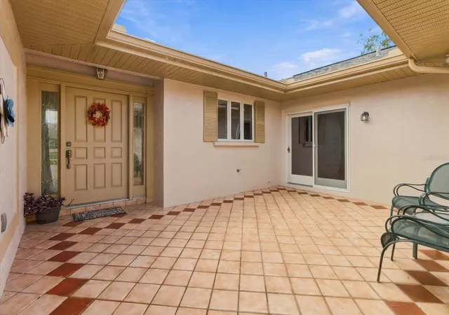 Photo 4 of Single family home for sale at 10404 Sandtrap Dr, Spring Hill, FL 34608 | MLS# W7889853 | Listing updated on 2026-09-27
