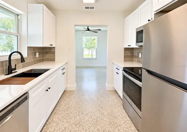 Photo 4 of Single family home for sale at 21132 Mcguire Ave, Port Charlotte, FL 33952 | MLS# TB8552408 | Listing updated on 2026-10-05