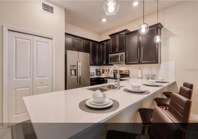 Photo 2 of Townhouse for sale at 1183 Drop Ln, Davenport, FL 33896 | MLS# O6445050 | Listing updated on 2026-10-07
