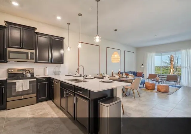 Photo 3 of Townhouse for sale at 1183 Drop Ln, Davenport, FL 33896 | MLS# O6445050 | Listing updated on 2026-10-07