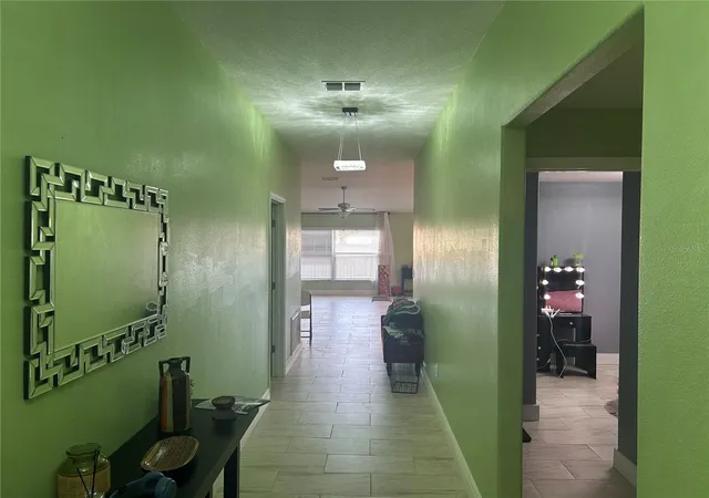 Photo 3 of Single family home for sale at 106 Cascade Bnd Dr, Ruskin, FL 33570 | MLS# TB8552439 | Listing updated on 2026-09-26
