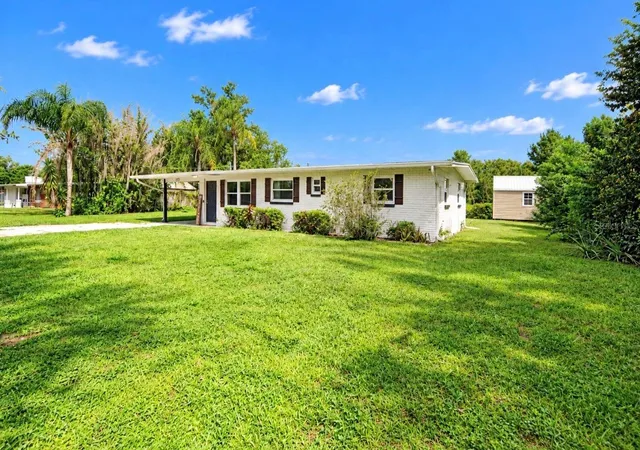 Photo 1 of Single family home for sale at 717 W Deer Lake Dr, Lutz, FL 33548 | MLS# TB8552458 | Listing updated on 2026-10-03
