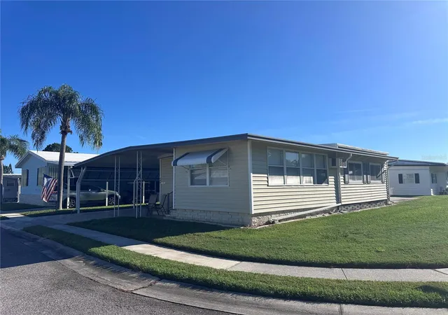 Photo 3 of Manufactured home for sale at 1100 Belcher Rd S #245, Largo, FL 33771 | MLS# TB8552459 | Listing updated on 2026-10-04