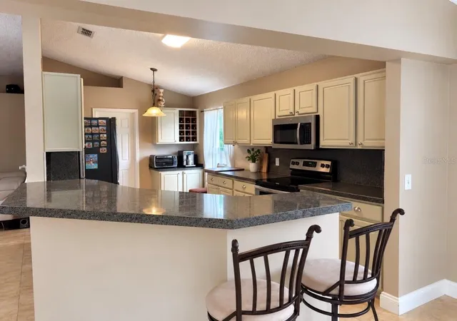 Photo 3 of Single family home for sale at 133 Spanish Bay Dr, Sanford, FL 32771 | MLS# O6445065 | Listing updated on 2026-09-30