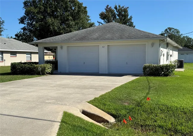 Photo 1 of Single family home for sale at 32 Raeland Ln, Palm Coast, FL 32164 | MLS# FC321719 | Listing updated on 2026-09-27