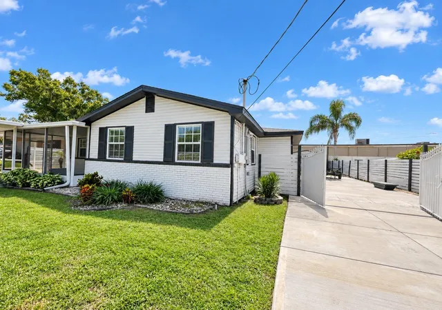 Photo 3 of Single family home for sale at 8512 Sunbeam Ln, Tampa, FL 33615 | MLS# TB8552503 | Listing updated on 2026-10-04
