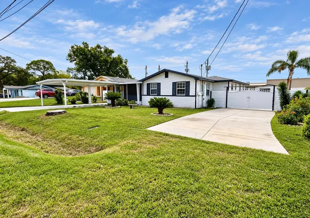 Photo 2 of Single family home for sale at 8512 Sunbeam Ln, Tampa, FL 33615 | MLS# TB8552503 | Listing updated on 2026-10-04