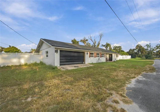 Photo 2 of Single family home for sale at 2412 Ne 11th Court, Ocala, FL 34470 | MLS# OM732946 | Listing updated on 2026-10-06