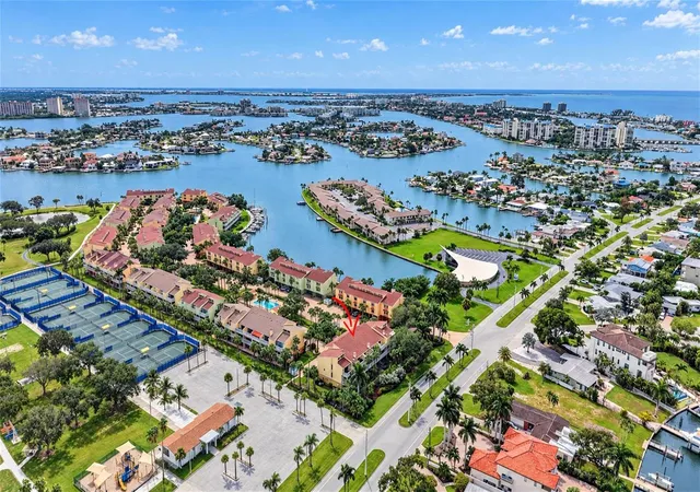 Photo 1 of Townhouse for sale at 406 Sandy Hook Rd, Treasure Island, FL 33706 | MLS# TB8552537 | Listing updated on 2026-10-04