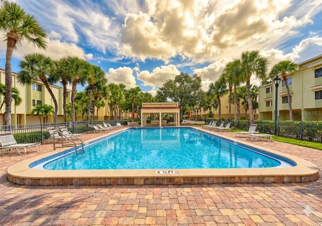 Photo 4 of Townhouse for sale at 406 Sandy Hook Rd, Treasure Island, FL 33706 | MLS# TB8552537 | Listing updated on 2026-10-04