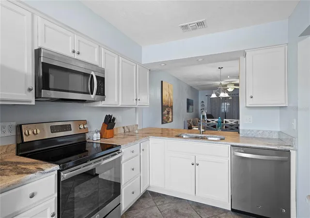 Photo 2 of Condo for sale at 340 Causeway Blvd #104, Dunedin, FL 34698 | MLS# TB8552546 | Listing updated on 2026-10-08