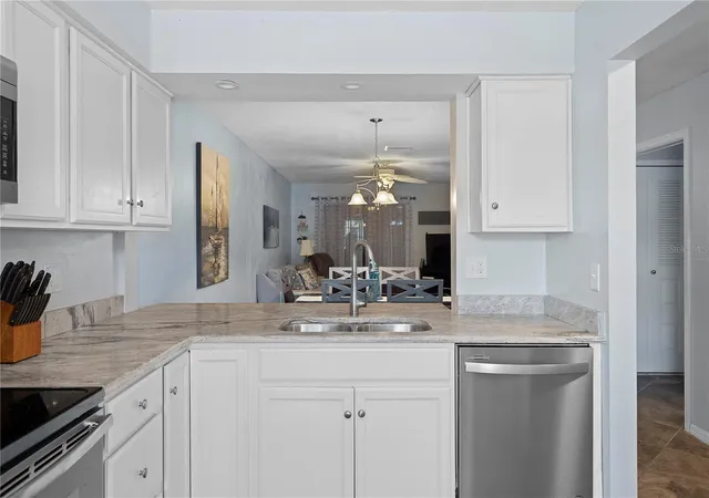 Photo 3 of Condo for sale at 340 Causeway Blvd #104, Dunedin, FL 34698 | MLS# TB8552546 | Listing updated on 2026-10-08