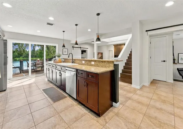 Photo 4 of Single family home for sale at 3006 River Grv Dr, Tampa, FL 33610 | MLS# TB8552549 | Listing updated on 2026-10-07