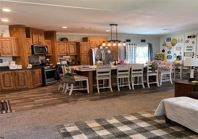 Photo 3 of Manufactured home for sale at 1310 Shady Cvs Rd W, Haines City, FL 33844 | MLS# W7889868 | Listing updated on 2026-09-27