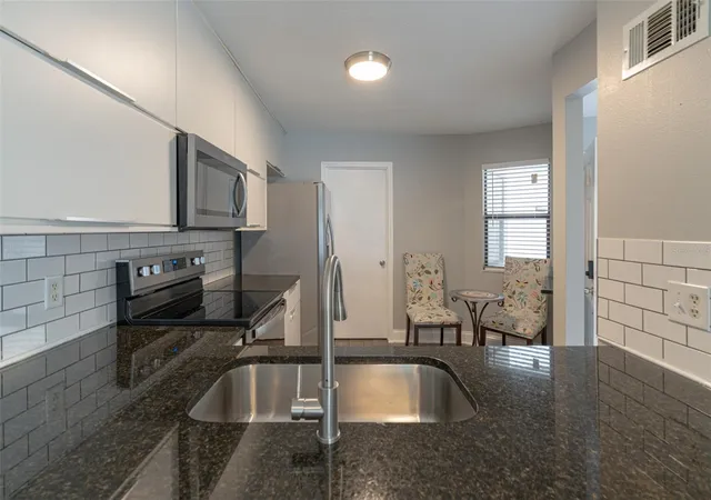 Photo 4 of Condo for sale at 5107 Ernst Ct #50, Orlando, FL 32819 | MLS# O6445152 | Listing updated on 2026-10-05