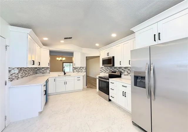Photo 4 of Single family home for sale at 1982 Greystone Trl, Orlando, FL 32818 | MLS# O6445164 | Listing updated on 2026-09-27