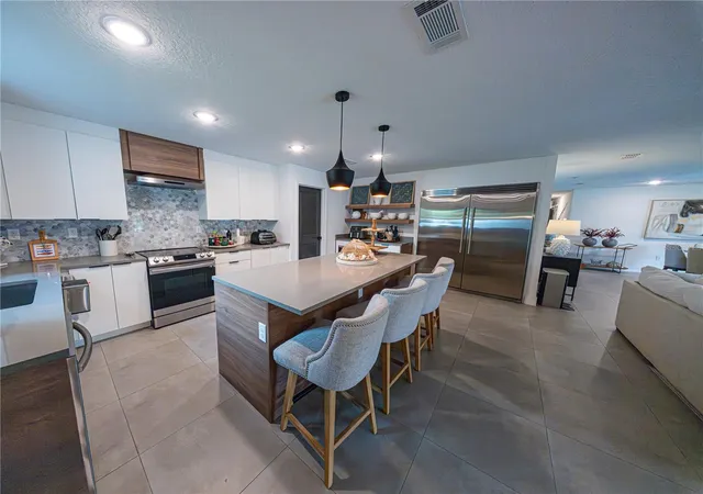 Photo 3 of Single family home for sale at 9197 Bay Hl Blvd, Orlando, FL 32819 | MLS# O6445174 | Listing updated on 2026-10-02