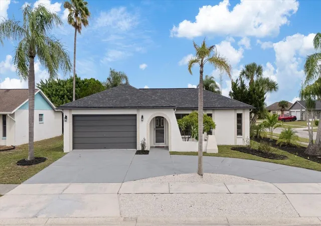 Photo 1 of Single family home for sale at 1016 Fuchsia Dr, Holiday, FL 34691 | MLS# TB8552589 | Listing updated on 2026-10-05